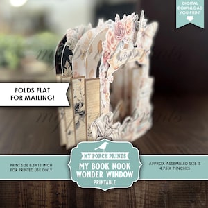 Peut inclure: Une fen&ecirc;tre imprimable pour coin de livre avec des accents floraux et papillons. La taille assembl&eacute;e est d'environ 12 x 18 cm. Le design comprend le texte "My Book Nook" et "Wonder Window". La taille d'impression est de 21,6 x 28 cm.