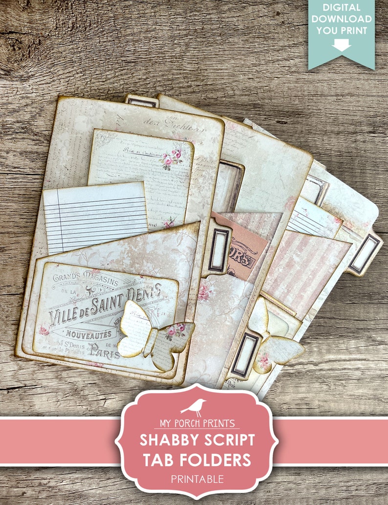 Op de afbeelding: Printbare tabbladen in shabby chic-stijl met een vintage Parijse thema. De tabbladen hebben een vlinderontwerp, schrijftekst en een bloemenpatroon. De tekst op de tabbladen luidt "Grands Magasins de la Ville de Saint Denis, Nouveaut&eacute;s de St. Denis, Paris".
