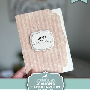 May include: Printable template for a scalloped card and envelope with a pink and white striped background. The card features the text "Happy Birthday" in a gray frame.