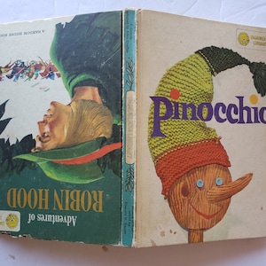 Adventures of Robin Hood and Pinocchio flip book, HC Dandelion Library