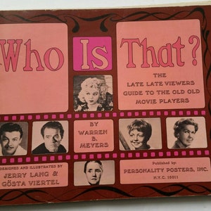 May include: Vintage book cover titled "Who Is That?" in pink and brown. The cover features portraits of classic movie stars and text that reads "The Late Late Viewers Guide to the Old Old Movie Players."