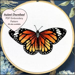 May include: Embroidered monarch butterfly design on white fabric in an embroidery hoop. The butterfly is orange, black, and white. The text "Instant Download PDF Embroidery Pattern Kit also available" is on a pink heart.