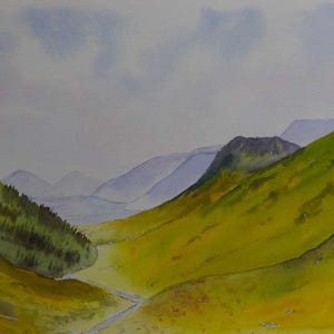 May include: Watercolour painting of a valley scene. The foreground shows green and yellow slopes, with a stream. Distant mountains are a misty blue, under a cloudy sky. A landscape art piece.