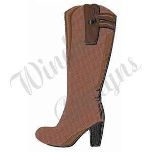 May include: A brown leather knee-high boot with a black heel and a brown leather strap with a button detail.