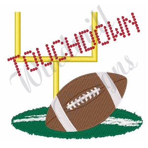 May include: A brown and white football with laces is lying on a green field with white lines. A gold football goal post is behind the football with the word "TOUCHDOWN" in red rhinestones above the goal post.