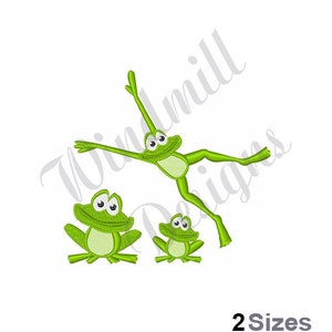May include: Three green frogs with large eyes and wide smiles. The largest frog is jumping with its legs outstretched. The two smaller frogs are sitting with their legs tucked under them. The image is a digital embroidery design.