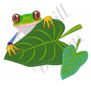 May include: A green and red frog with large eyes is perched on a large green leaf. The frog has orange feet and a blue stripe on its leg. There is a smaller green leaf to the right of the frog.