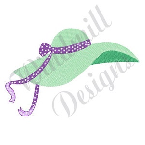 May include: A green sun hat with a purple ribbon and white polka dots.