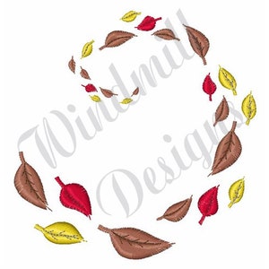 May include: A wreath of brown, red, and yellow leaves in a circular shape. The leaves are arranged in a swirling pattern.