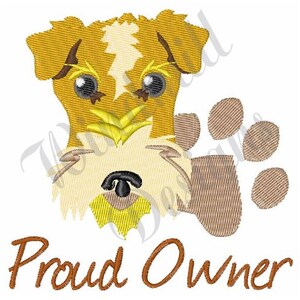 May include: A cartoon illustration of a brown and white dog with a paw print. The text "Proud Owner" is below the dog.