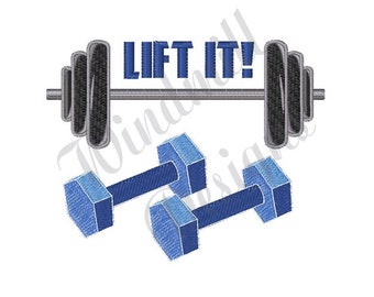 May include: An embroidered design featuring a barbell with weights and two dumbbells. The text "LIFT IT!" is above the barbell. The design is in shades of blue and grey, perfect for fitness enthusiasts.
