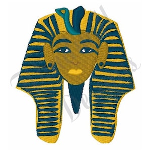 May include: A gold and blue embroidered image of an Egyptian pharaoh's head with a cobra on the crown.