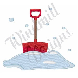 May include: A red plastic snow shovel with a wooden handle is partially submerged in a pile of white snow. The snow is textured to look like a pile of snow.