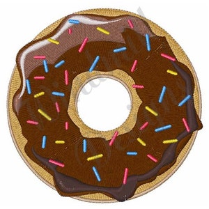 Könnte beinhalten: Ein Schokoladen-Donut mit bunten Streuseln. Der Donut ist hellbraun und der Überzug ist dunkelbraun. Die Streusel sind rosa, blau und gelb.