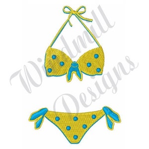 May include: Embroidered yellow bikini with blue polka dots and accents. The top features a bow design and halter straps. The bottom has matching blue accents. The design is set against a white background.