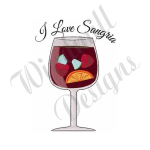 May include: Embroidered design of a glass of red sangria with fruit and ice. The text "I Love Sangria" is above the glass.