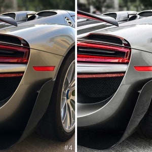 May include: A silver Porsche 918 Spyder with a black rear diffuser and red taillights. The car is parked on a gray surface. #4