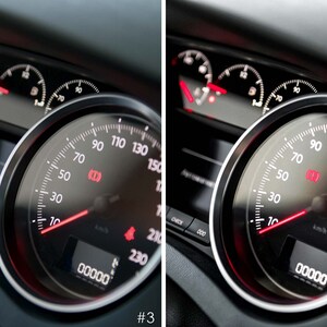 May include: A close-up of a car's dashboard with a speedometer reading 10 km/h. The speedometer has a red needle and a black face with white markings. The digital display shows 00000.