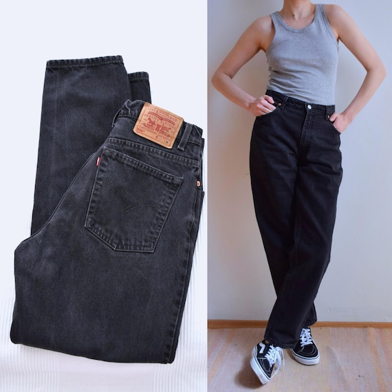 1990s Levi's 550 black jeans, relaxed fit, tapered leg, 28.5 inch waist, USA made