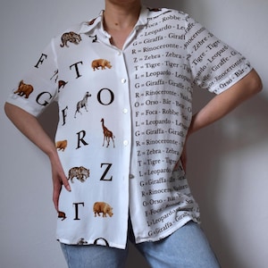90s Safari Print Blouse: Vintage African Animals Short Sleeve Shirt