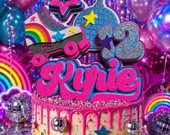 May include: A multi-tiered cake with a rainbow gradient base, pink icing drips, and colourful sprinkles. The cake topper features a roller skate, a disco ball, a star, and the name Kyrie in pink glitter, alongside the number 12 in blue glitter.