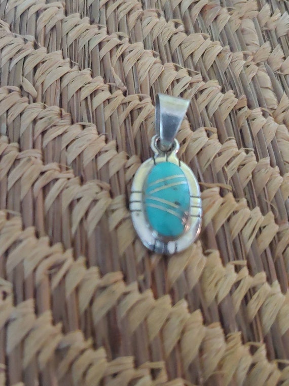 Navajo,Turquise and  sterling silver signed pendan