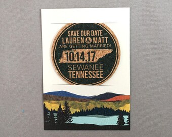 May include: A save-the-date card with a cork-like circular design. The text reads "Save Our Date Lauren & Matt Are Getting Married! 10.14.17 Sewanee Tennessee." A landscape illustration of mountains and trees is at the bottom.