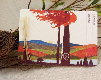 May include: A fall-themed invitation or reservation card with a red, orange, and yellow tree silhouette against a white background with a blue mountain range in the distance. The card has the words "Invitation" and "Reservation" printed on the right side. The card also has a brown bear silhouette in the bottom left corner.