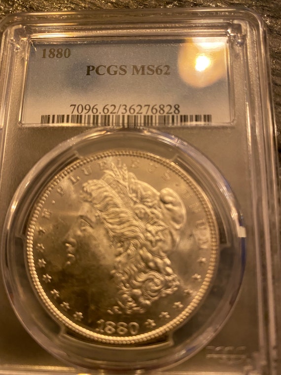 1880 Morgan Silver Dollar MS62 Graded Through PCGS Gorgeous Coin a Must  Have in Your Collection 