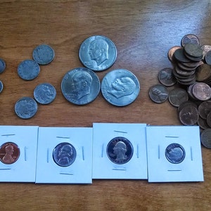 Full pound of Wheat Pennies, Ikes, Buffalo nickels, silver barber dimes and carded proof coins.  A nice lot of coins for a new collector