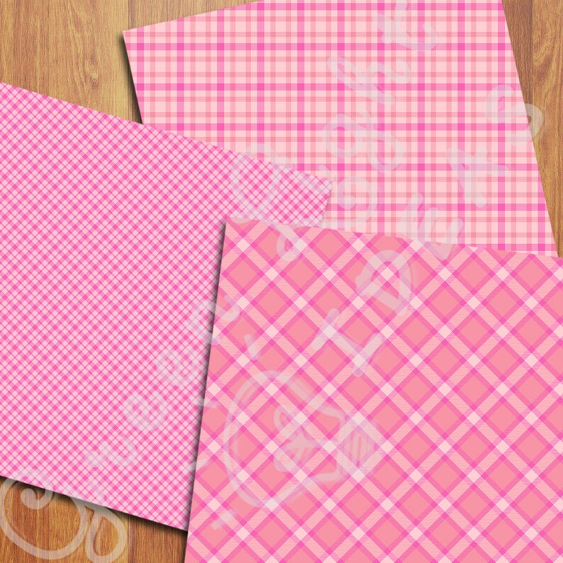 Op de afbeelding: Drie roze en witte geruite papieren. De patronen zijn verschillend, maar alle hebben roze en witte vierkanten.