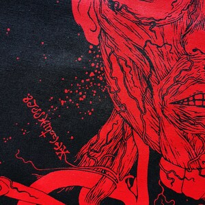 May include: Red and black graphic print of a human face with exposed muscle and veins. The face is contorted in a grotesque expression. The print is on a black background.