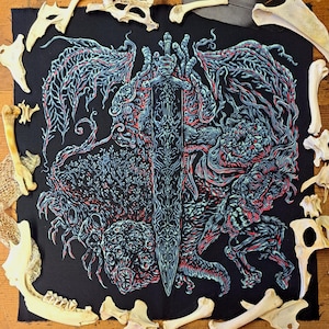 May include: A square black fabric patch featuring a detailed illustration of a central sword surrounded by intricate, organic, and monstrous forms in shades of light blue, white, and red. The design includes swirling textures and multiple eye-like shapes.