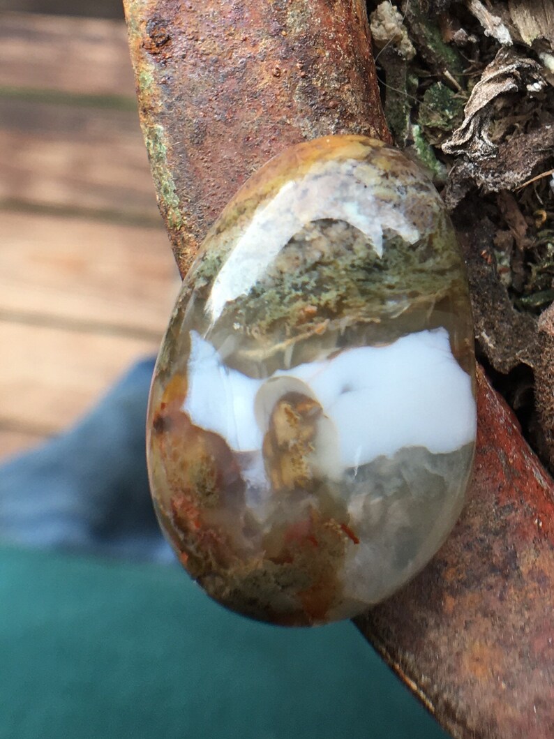 Egg shaped plume agate with green purple under water seascape moss agate thunder egg
