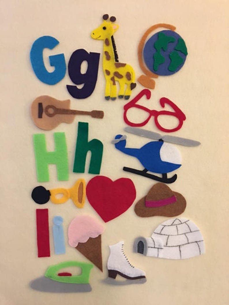 May include: Felt craft set with letters G, H, I, and lowercase versions of each letter.  The set also includes a giraffe, a globe, glasses, a guitar, a helicopter, a heart, a hat, an ice cream cone, an igloo, an iron, and an ice skate.