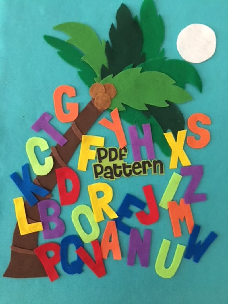 May include: A felt alphabet set with letters in various colors, arranged around a brown felt palm tree trunk with green felt leaves. The letters are arranged in a random order, and the palm tree is set against a turquoise background. The text "PDF Pattern" is visible on a yellow felt tag.