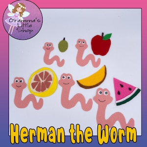 May include: A felt craft set featuring Herman the Worm, a pink worm with googly eyes, and various fruits including a red apple, a yellow lemon, a green lime, a yellow slice of mango, and a pink watermelon slice.