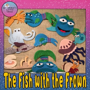 May include: A felt craft set featuring a variety of sea creatures, including a blue fish with a frown, an octopus, a jellyfish, and a crab. The set is titled "The Fish with the Frown".