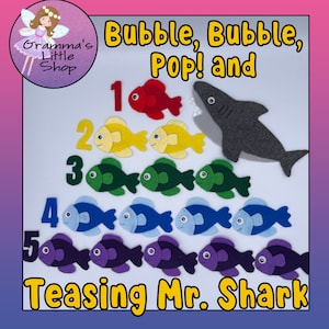 Puede incluir: Una actividad de conteo de fieltro para niños con un tiburón con la boca abierta y cinco filas de peces coloridos. Los números del 1 al 5 se muestran encima de cada fila de peces. El texto "Bubble, Bubble, Pop! and Teasing Mr. Shark" se muestra en la parte superior de la imagen.