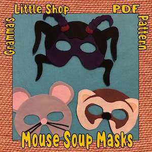 May include: A set of three felt masks for a play or party. The masks are of a mouse, a ferret, and a spider. The masks are all in shades of brown, gray, and black. The text "Mouse Soup Masks" is printed in yellow at the bottom of the image. The text "PDF pattern" is printed in yellow on the right side of the image. The text "Little Shop" is printed in yellow on the left side of the image. The text "Grandma's" is printed in yellow on the left side of the image.