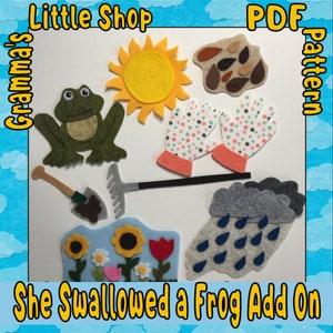 May include: Felt craft patterns for a "She Swallowed a Frog" felt board story. The patterns include a frog, sun, gardening gloves, a rake, a shovel, a cloud with raindrops, and a garden scene with flowers.