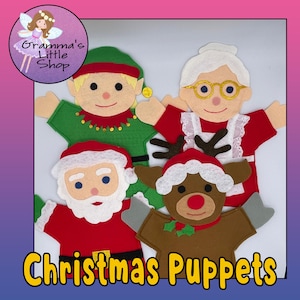 Pode incluir: Conjunto de quatro fantoches de Natal de feltro: Papai Noel, um duende, uma rena e uma avó. Os fantoches são vermelhos, verdes, marrons e brancos.