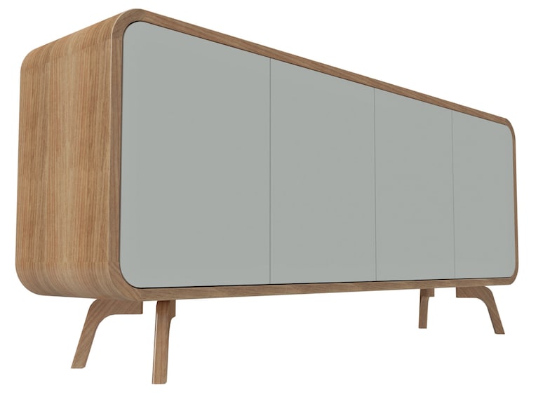 May include: A light gray cabinet with three doors and rounded edges. The cabinet is made of wood and has four legs.