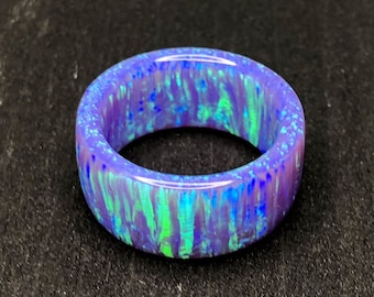 Periwinkle fire solid opal ring