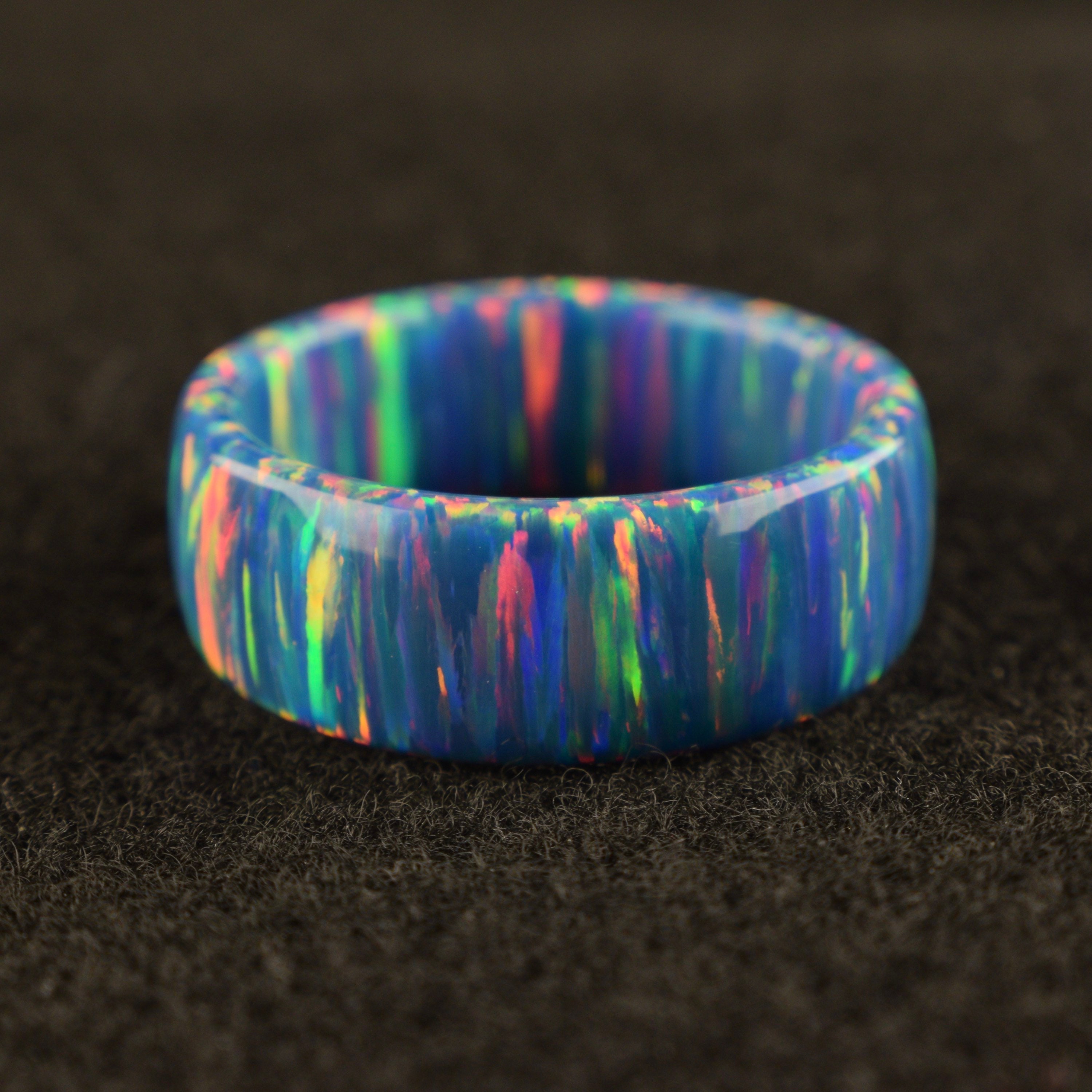 Teal blue fire solid bello opal ring