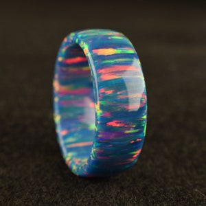 Teal blue fire solid bello opal ring