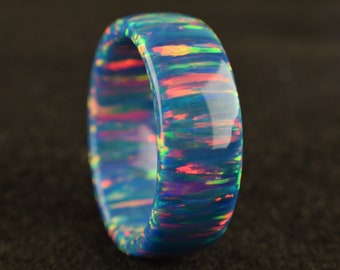 Teal blue fire solid bello opal ring