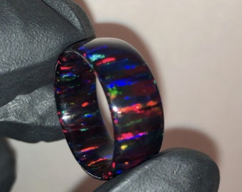 Crimson black solid opal ring