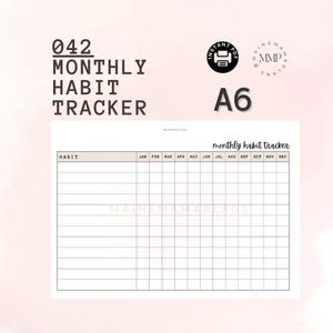 May include: A printable A6 monthly habit tracker with a black and white grid layout. The tracker has a column for each month of the year and rows for different habits. The text "monthly habit tracker" is at the top of the page.