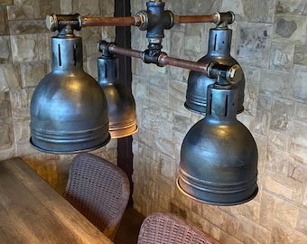 Industrial pendant chandelier in steampunk style. Hanging ceiling lamp for hall and dining room